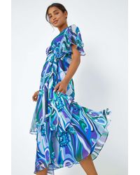 Roman - Floral Swirl Print Chiffon Tiered Wrap Dress - Lyst