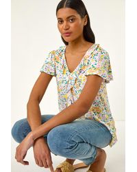 Roman - Floral Print Ruffle V-Neck Top - Lyst