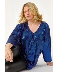 Roman Curve - Sparkle V-Neck Stretch Tunic Top - Lyst