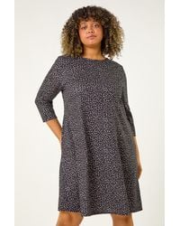 Roman Curve - Spot Print Stretch Swing Dress - Lyst