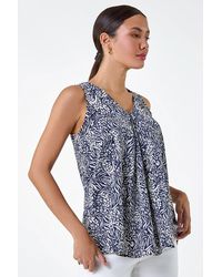 Lilly-and-Hope - Animal Print Pleat Front V-Neck Top - Lyst