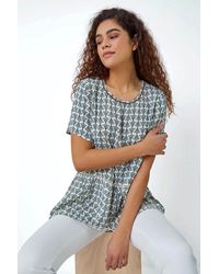 Roman - Abstract Print Sequin Peplum Top - Lyst