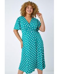 Roman Curve - Spot Print Midi Wrap Dress - Lyst