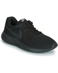 black nike tanjun trainers womens