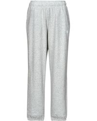 New Balance - Tracksuit Bottoms French Terry JOGGER - Lyst