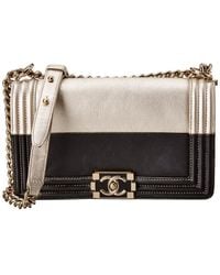 chanel boy bag gold and black