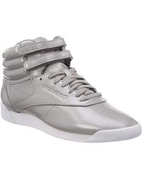 all white high top reeboks