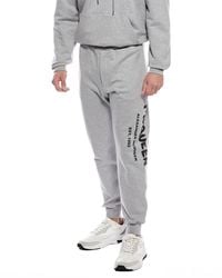 McQueen - Cut & Sew Graffiti Print Jogger Pant - Lyst