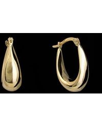 Italian Gold - 14k Tapered Oval Hoops - Lyst