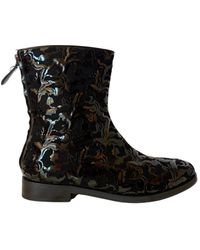 Alaïa - Black Patent Leather Ankle Boots - Lyst