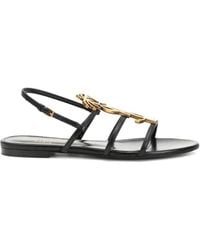 Saint Laurent - Metal Monogram Cassandra Sandals - Lyst