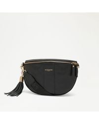 Russell & Bromley - Rotate Women's Black Leather Curved Crossbody Bag - Lyst