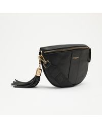 Russell & Bromley - Rotate Women's Black Leather Curved Crossbody Bag - Lyst