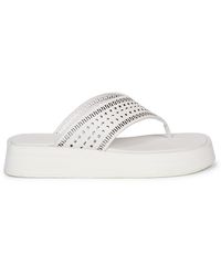 AlaÃ¯a Perforated Leather Platform Thong Sandals in Black - Lyst