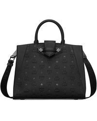 mcm essential tote in monogram leather