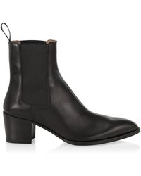 louboutin boots saks