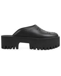 black flatform mules