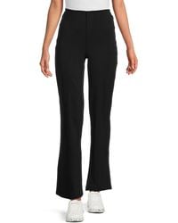 Spyder - High Rise Crepe Flare Pants - Lyst