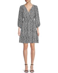 Collective Concepts - Puff Sleeve Cutout Mini Dress - Lyst