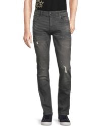 Class Roberto Cavalli - High Rise Splatter Distressed Jeans - Lyst