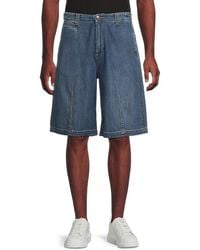 McQueen - Darted Cotton Denim Shorts - Lyst