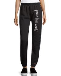 Peace Love World Logo Jogger Pants Lyst Peace Love World Logo Jogger Pants Lyst