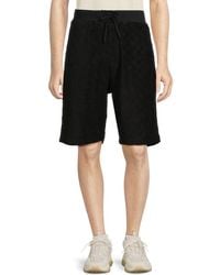 Ambush - Monogram Print Shorts - Lyst