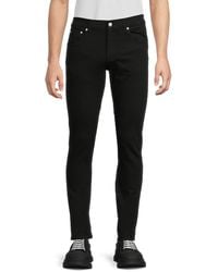 McQueen - Solid Cotton Slim-Fit Jeans - Lyst