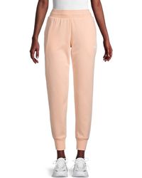PUMA Track pants and sweatpants for 