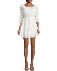 7021 - Eyelet-embroidered Mini Tiered Dress - Lyst