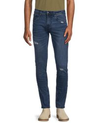 Class Roberto Cavalli - Mid Rise Distressed & Whiskered Jeans - Lyst
