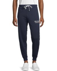 TOMMY HILFIGER Navy Blue Graphic Leg Logo Joggers Sweatpants Size M BNWT 