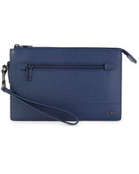tumi clutch