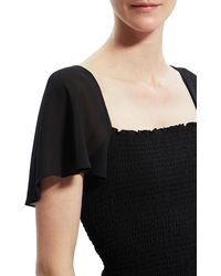 Theory - Flutter Sleeve Smocked Top - Lyst