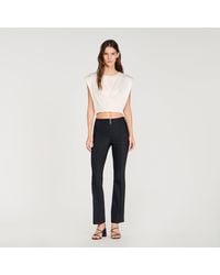 Sandro - Pleat And Zip Trousers - Lyst