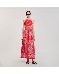 Sandro - Robe longue à imprimé bandana - Lyst