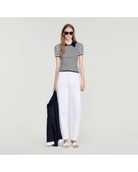 Sandro - Pull style polo à rayures - Lyst