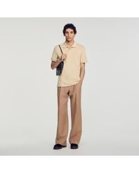 Sandro - Cotton Polo Shirt With Leather Logo - Lyst