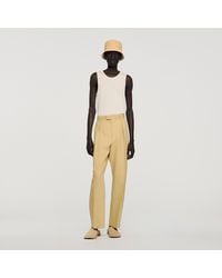 Sandro - Wide Pleated Cotton-Linen Trousers - Lyst