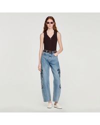 Sandro - Ribbed Knit Polo Bodysuit - Lyst