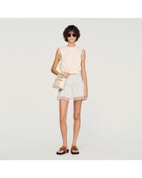 Sandro - Cropped Cotton T-Shirt With Lace - Lyst