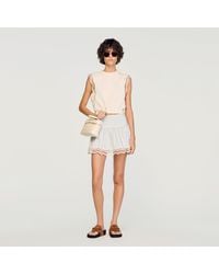 Sandro - Cropped Cotton T-Shirt With Lace - Lyst