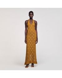 Sandro - Robe longue en maille à pampilles - Lyst