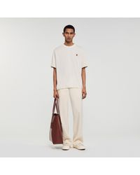 Sandro - Leather Logo T-Shirt - Lyst