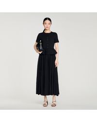 Sandro - Peplum Knit Maxi Dress - Lyst