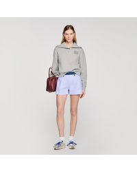 Sandro - Embroidered Split Neck Sweatshirt - Lyst