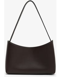 The Row - Alma Baguette Dark Shoulder Bag - Lyst