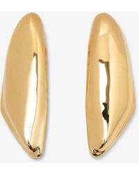 Alaïa - Bombe Gold Earrings - Lyst