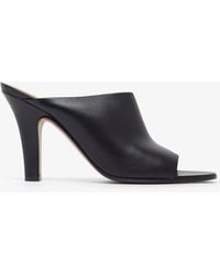 The Row - Signum Black Leather Mules - Lyst