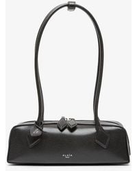 Alaïa - Le Teckel Small Black Leather Bag - Lyst